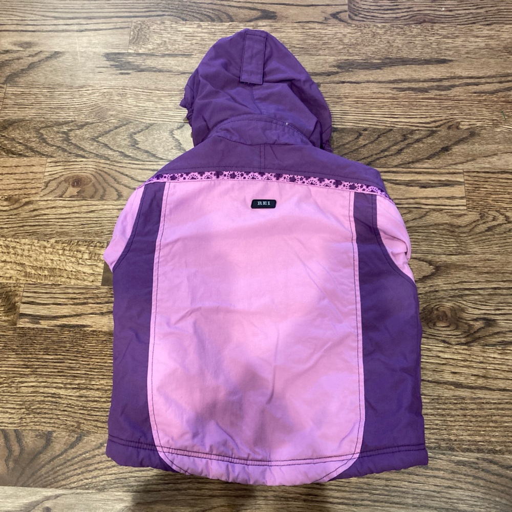 REI brand toddler parka with growth tuck to help your coat grow with your child.